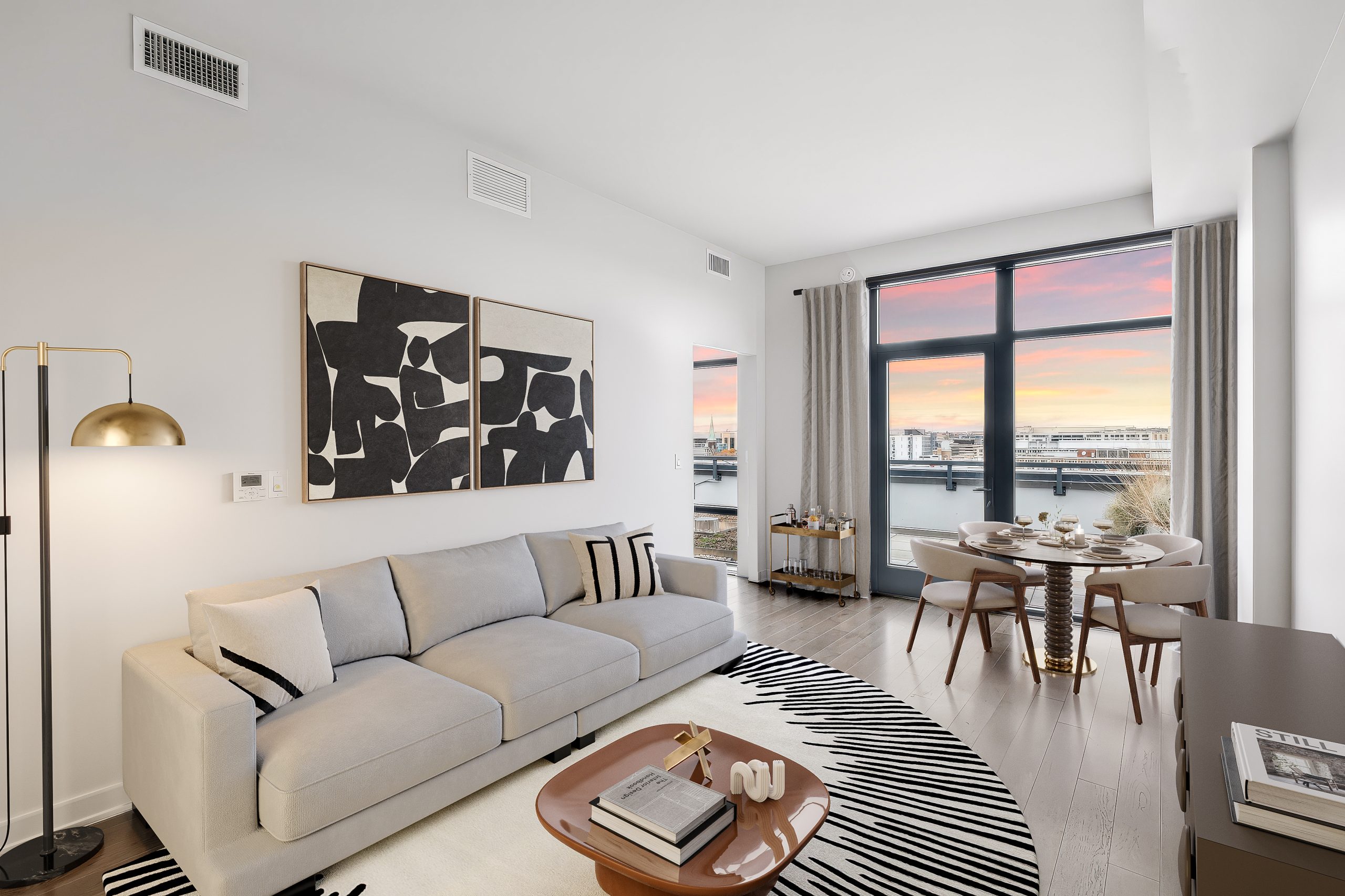 image of https://www.thewesterlydc.com/wp-content/uploads/2025/03/TheWesterly_INT_Apartments_1208LivingroomDusk_Spotless_Feb2025-scaled.jpg
